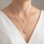 Gold Tiered Butterfly Pendant Necklace