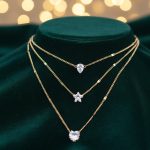Trinity Gold Layered Necklace – Pear, Star & Heart Charms